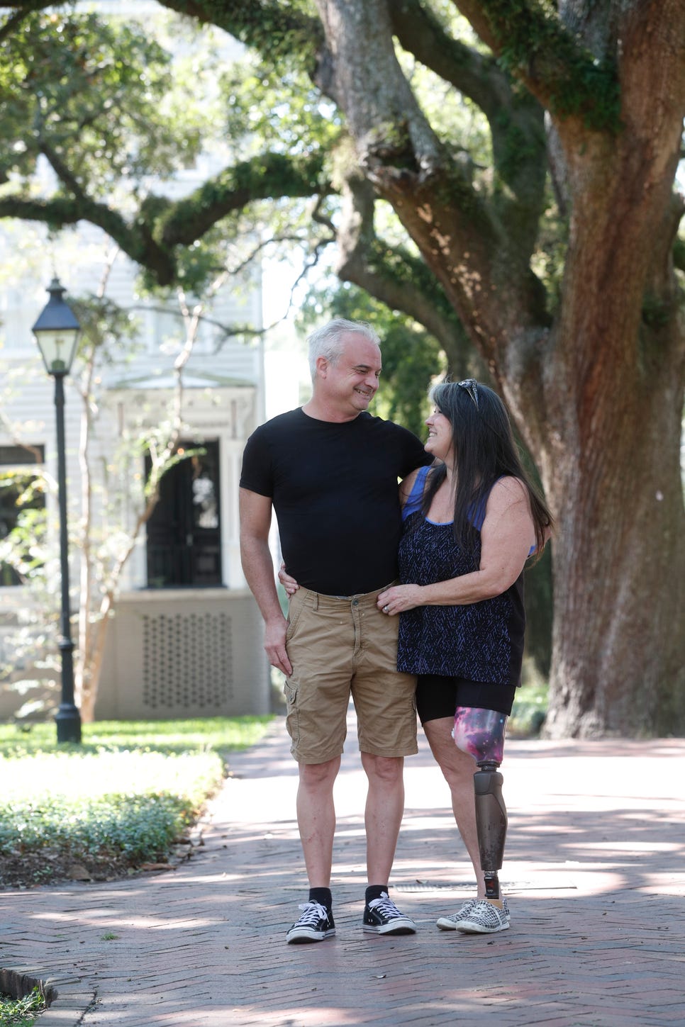 Marley and Patrick Burns walking in Savannah square