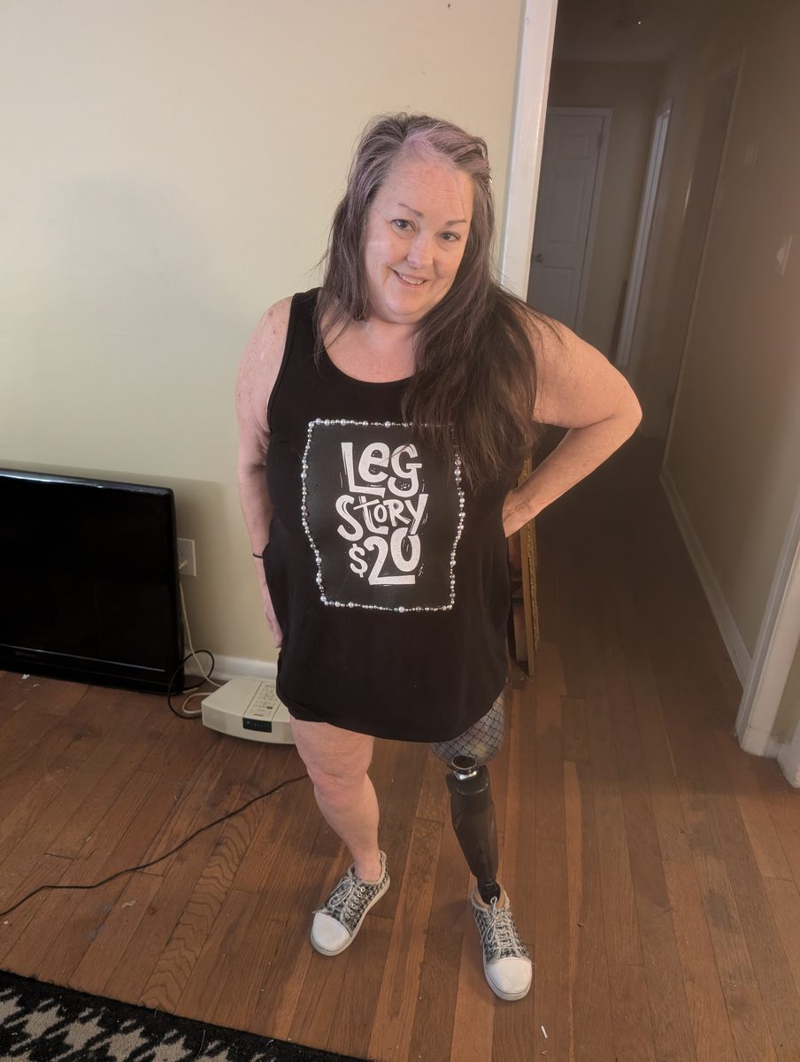 Marley Gibson wearing Leg Story shirt with prosthetic leg